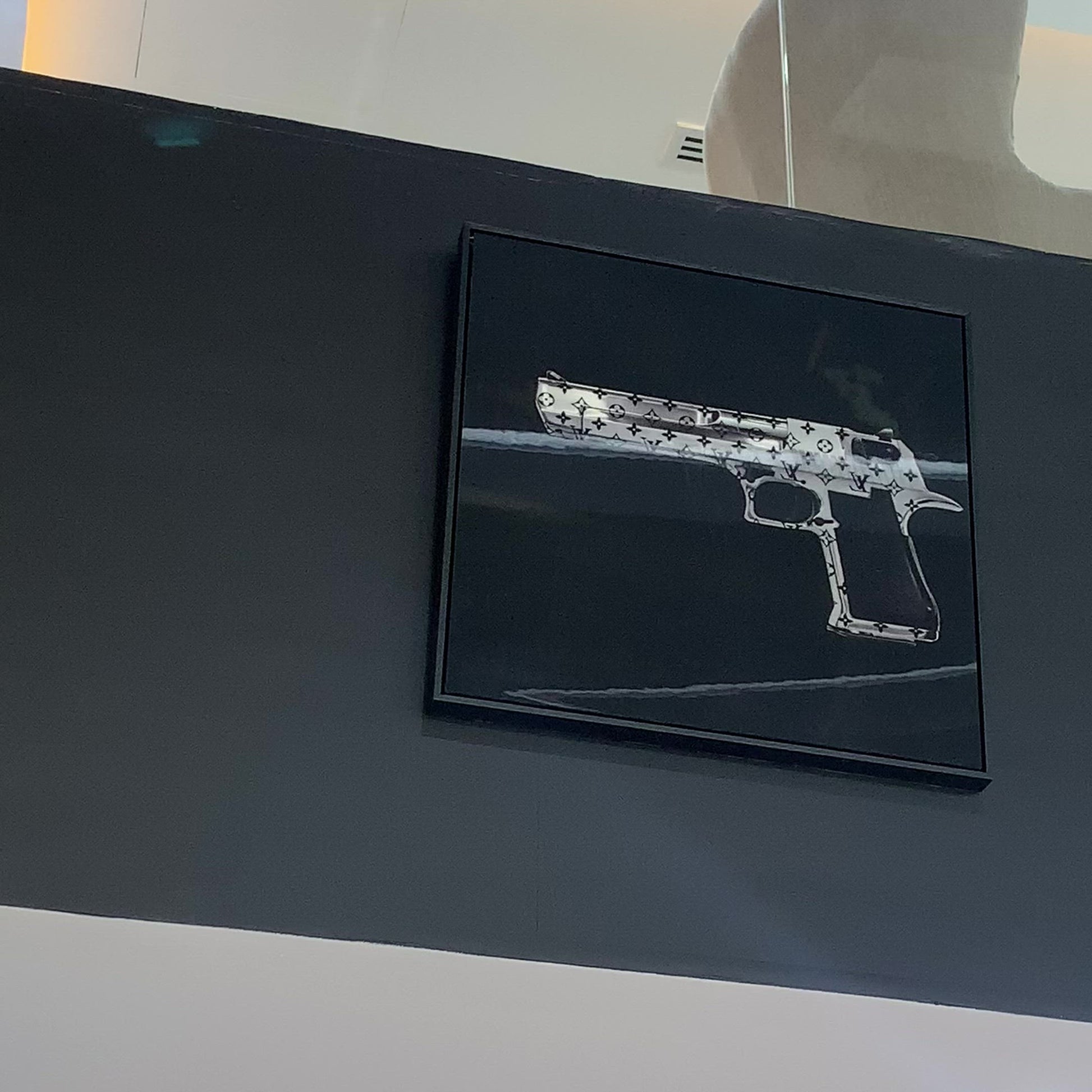 silver louis vuitton gun