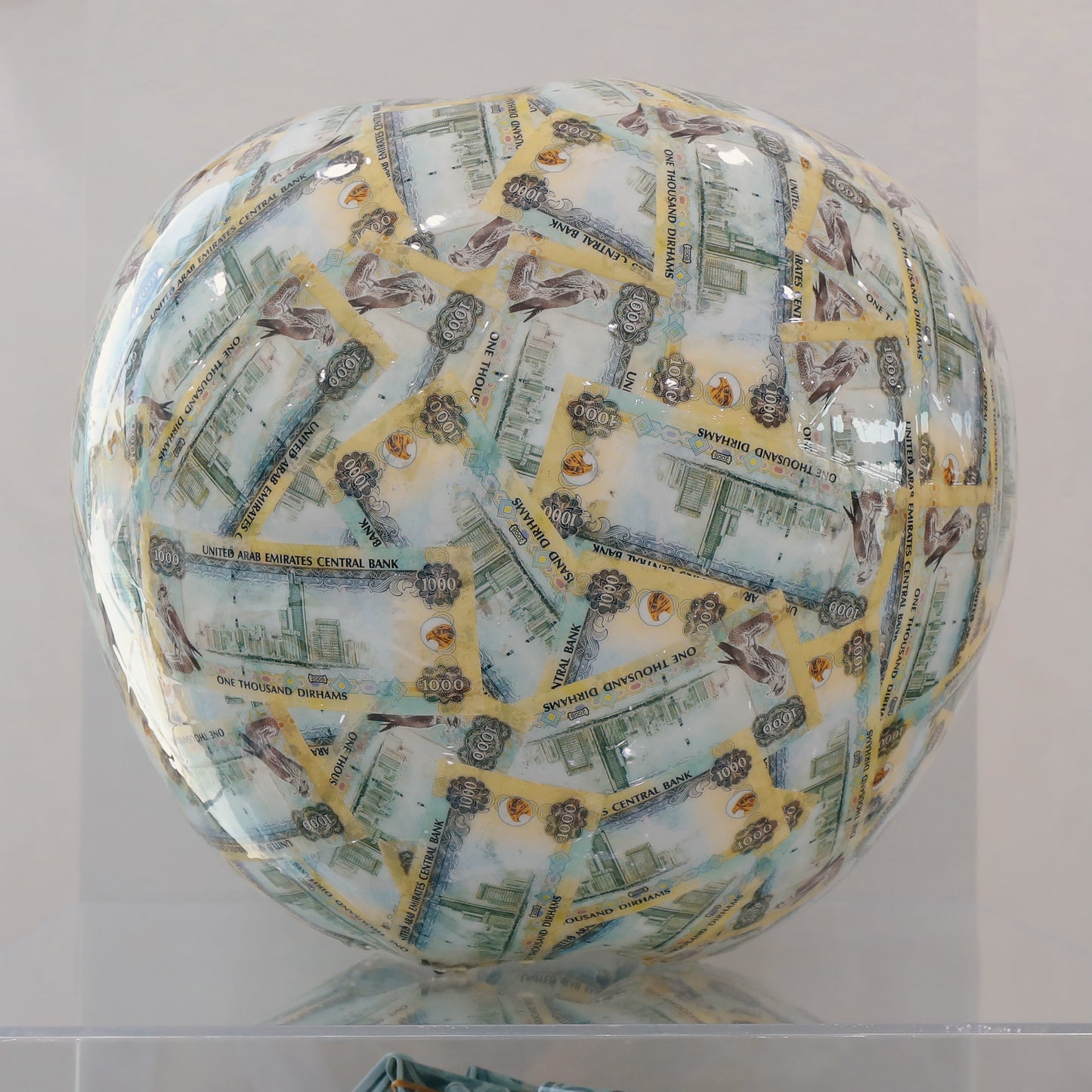 Dirham apple sculpture